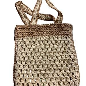 breach women's Handbag